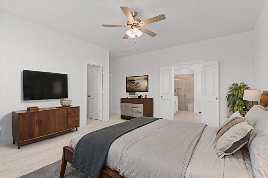 Another view of the beautiful primary suite showcases the generous layout and elegant design. Plenty of room for large furniture, a TV setup, and more—truly a serene space to unwind. *Virtually Staged*