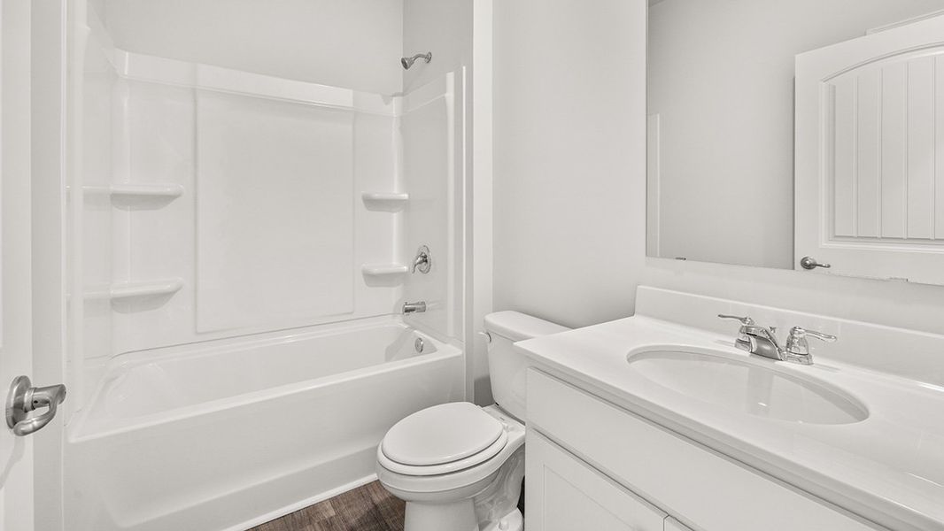 Representative furnished interior of a home built from the Aria by D.R. Horton in Lost Creek, Dallas (Image 11).