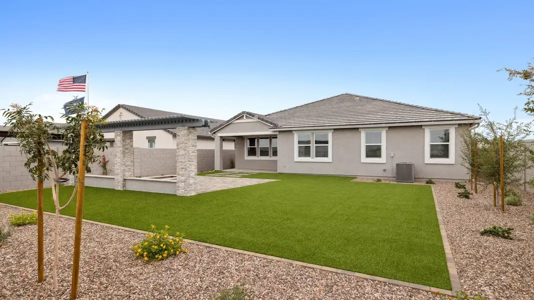 Front exterior of a new home in Quail Ranch, San Tan Valley, AZ, highlighting curb appeal (Image 2). Front exterior of a new home in Quail Ranch, San Tan Valley, AZ, highlighting curb appeal (Image 2).