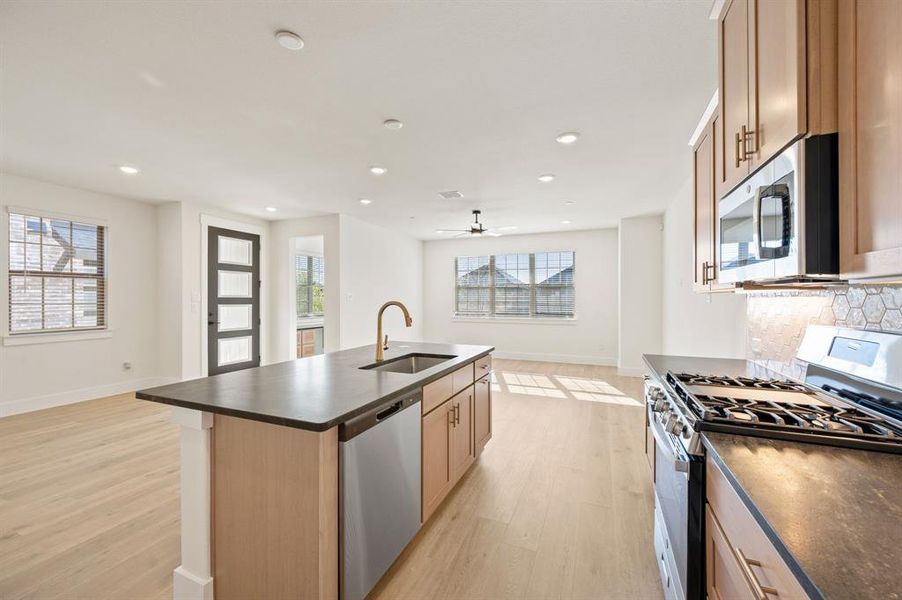 The chef in the family will never be left out of the party in this delightful open concept floor plan. The chef in the family will never be left out of the party in this delightful open concept floor plan.