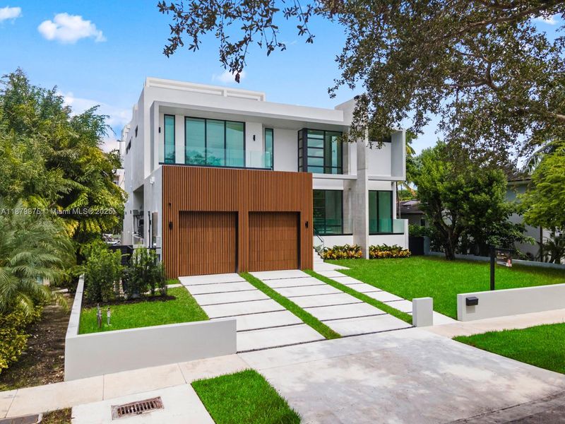 Front exterior of a new home in , Miami Shores, FL, highlighting curb appeal (Image 27).