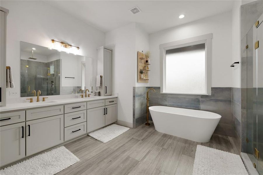 Don't have time to go to the spa?? That's ok -- just head to your OWN private bath room with all the spa-like treatments at no additional costs!  Double sinks - no fighting! Love the drawers for storage as well as the upper cabinets for all your morning necessities.