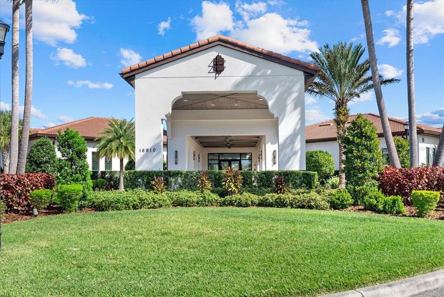 Front exterior of a new home in Southshore Bay Active Adult: Active Adult Manors, Wimauma, FL, highlighting curb appeal (Image 24).