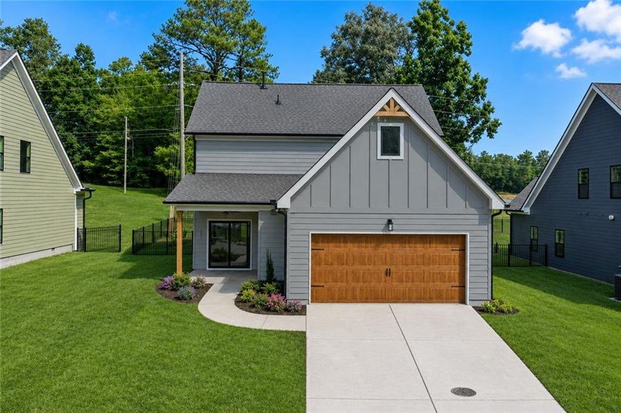 Front exterior of a new home in , Emerson, GA, highlighting curb appeal (Image 23).