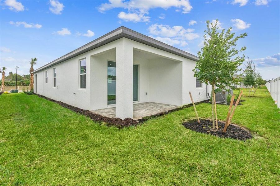 Exterior details and patio area of a home in Southpointe, Palmetto (Image 3).