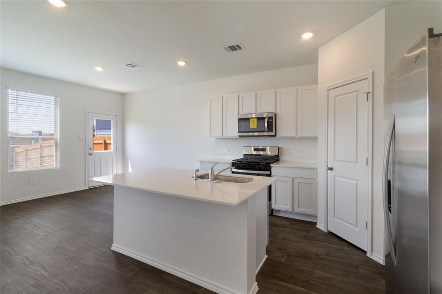 Furnished interior view inside a new home in Marigold, Uhland (Image 7).