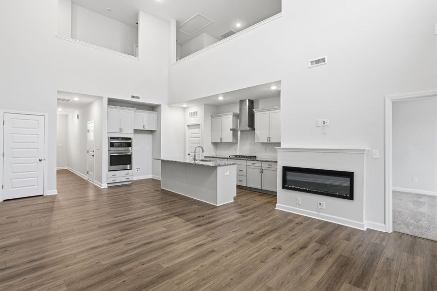 Furnished interior view inside a new home in Ovation at Sweetbrier, Durham (Image 7).