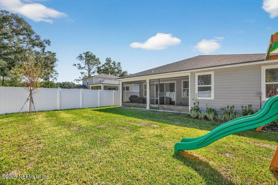 Exterior details and patio area of a home in Sandridge Hills, Green Cove Springs (Image 26).