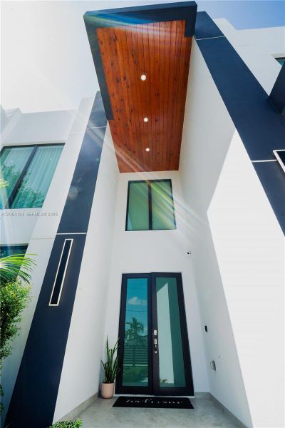 Exterior details and patio area of a home in , Miami (Image 40). Exterior details and patio area of a home in , Miami (Image 40).