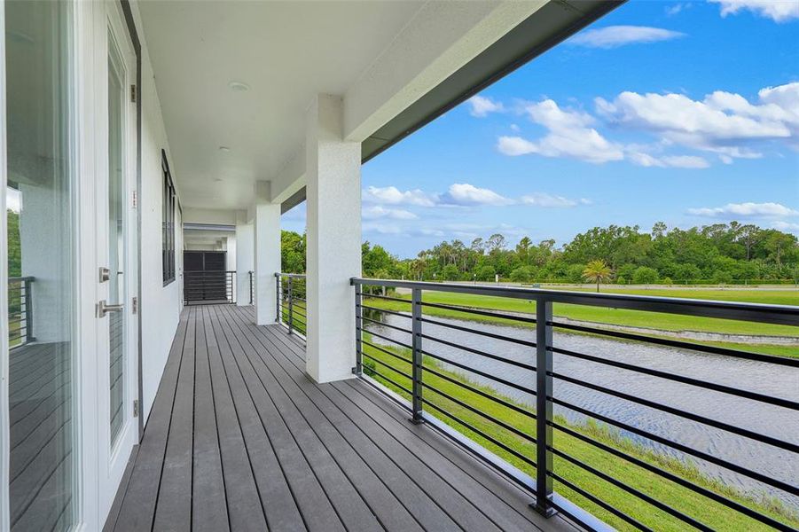 Exterior details and patio area of a home in Hampton Green at Providence, Davenport (Image 33).