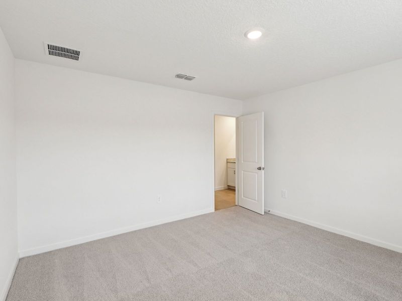 Spacious, unfurnished interior of a new home in Colbert Landings - Signature Series, Palm Coast (Image 7).