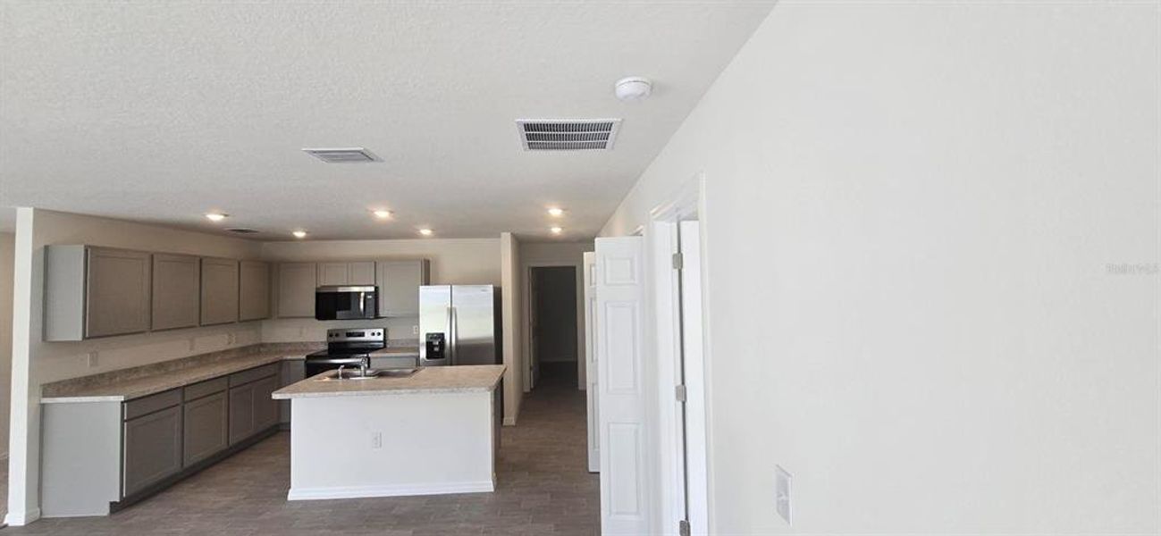 Furnished interior view inside a new home in , Poinciana (Image 9). Furnished interior view inside a new home in , Poinciana (Image 9).