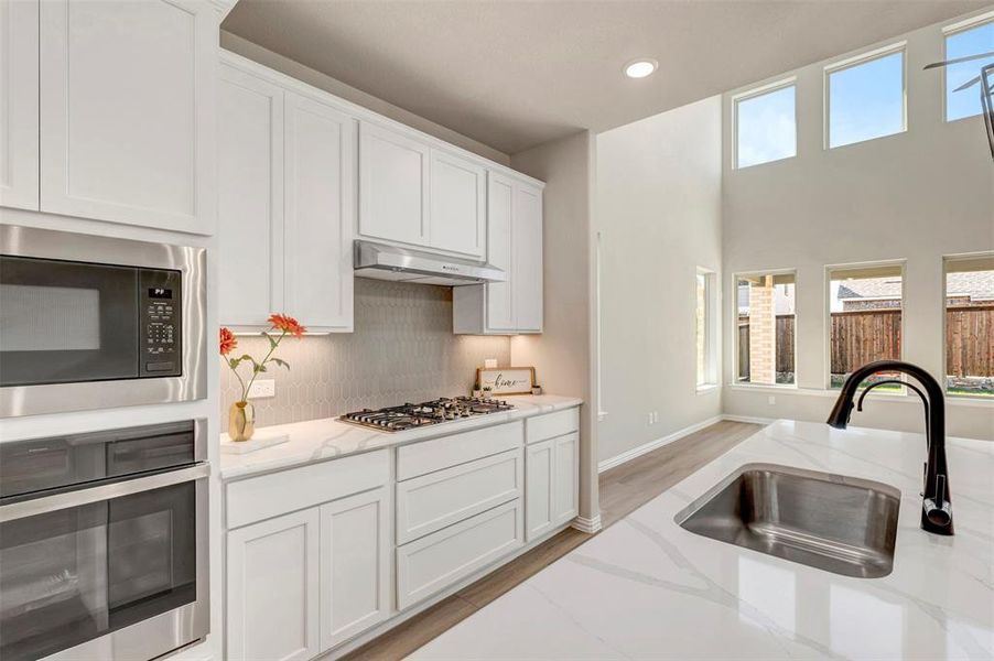 Furnished interior view inside a new home in Lily Creek at Sutton Fields, Aubrey (Image 16).