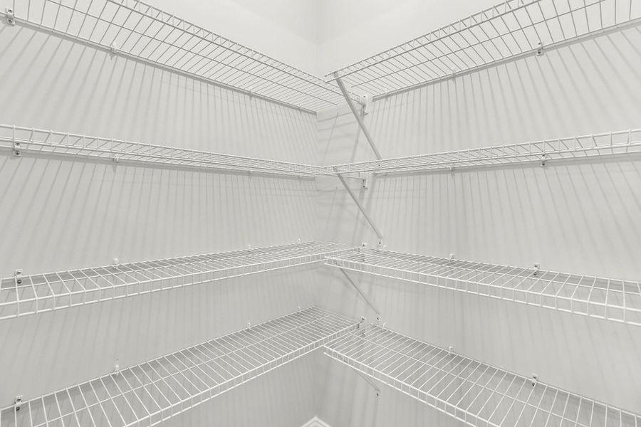 Spacious, unfurnished interior of a new home in Tidewater at Lakes of Cane Bay, Summerville (Image 39).