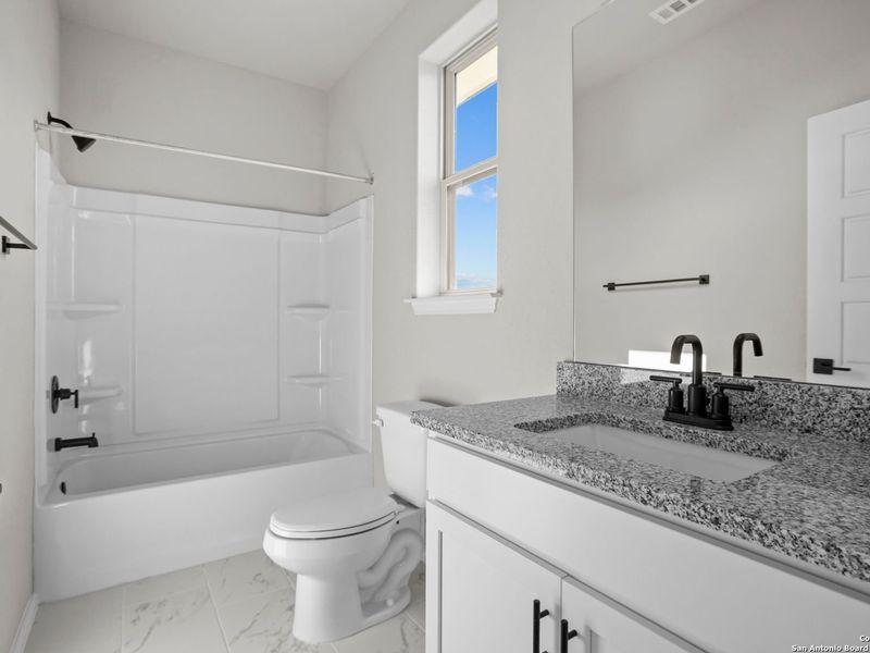 Furnished interior view inside a new home in Hannah Heights, Seguin (Image 13).