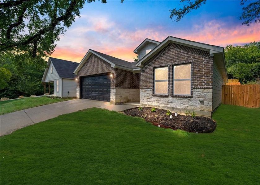 Front exterior of a new home in , Fort Worth, TX, highlighting curb appeal (Image 2). Front exterior of a new home in , Fort Worth, TX, highlighting curb appeal (Image 2).