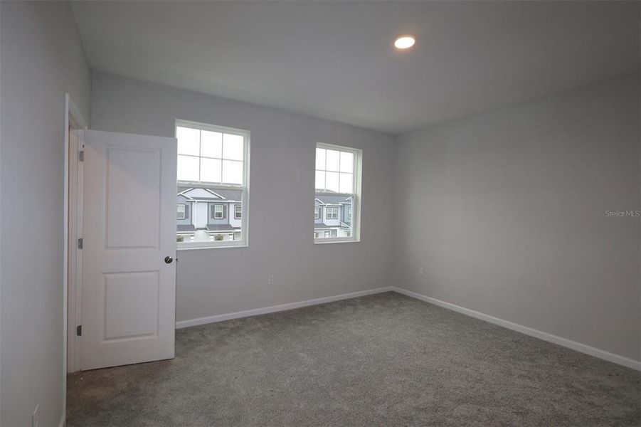 Spacious, unfurnished interior of a new home in Emerson Pointe, Apopka (Image 11).