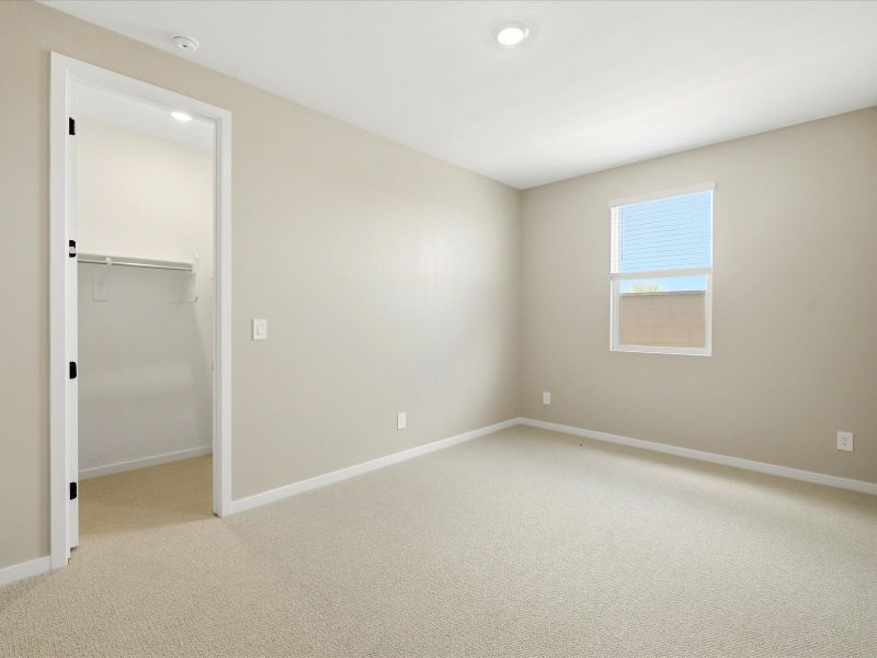 Spacious, unfurnished interior of a new home in Blossom Rock Signature Series, Apache Junction (Image 18).