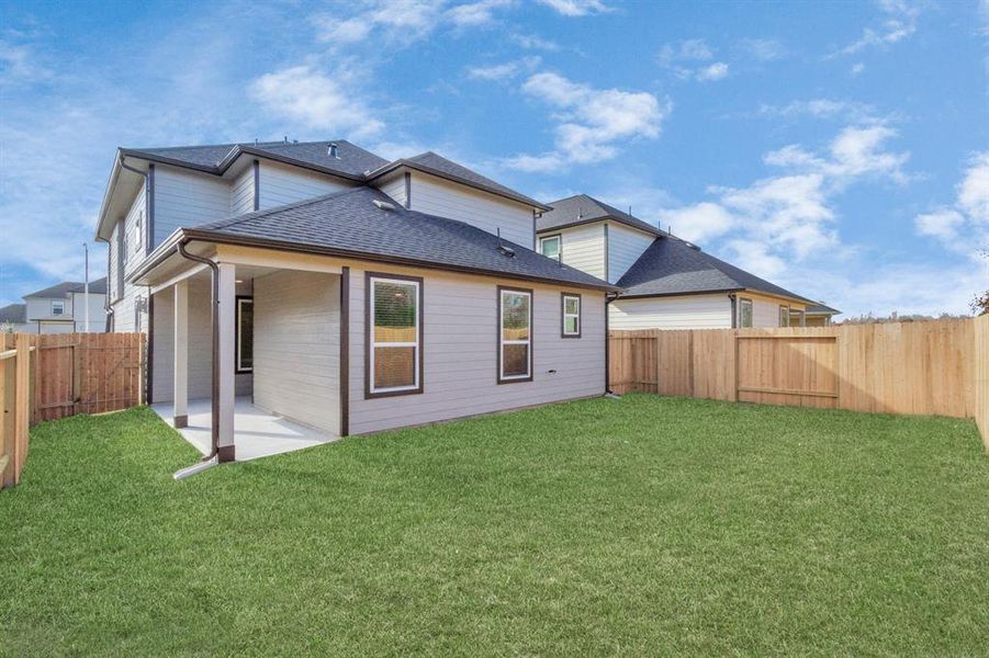 Come and see this spacious backyard with its beautiful covered patio. There is plenty of room for the kids to play and adults to relax. Perfect for your outdoor living space, patio furniture, bbq pit, and so much more. Sample photo of completed home with similar floor plan. As-built interior colors and selections may vary.