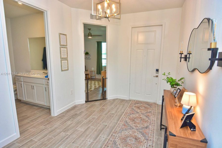 Furnished interior view inside a new home in Central Park, Port St. Lucie (Image 5).