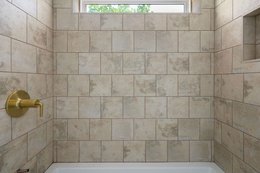 Bathroom featuring a healthy amount of sunlight