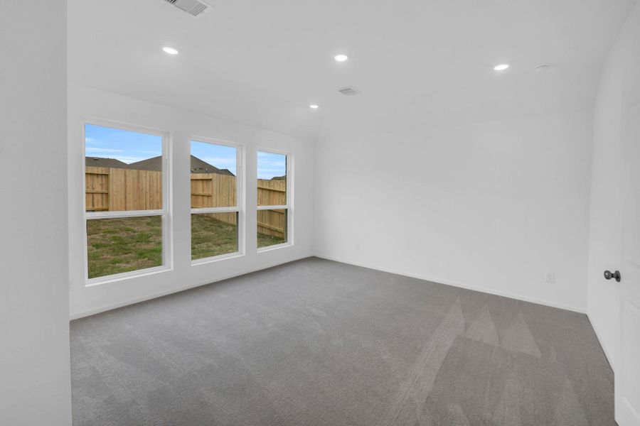 Spacious, unfurnished interior of a new home in Windrose Green: Bristol Collection, Angleton (Image 19).