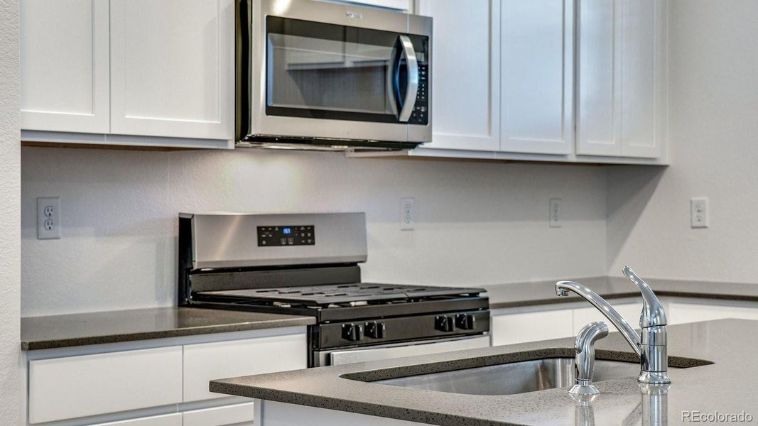 Close-up of interior finishes inside a home in Settlers Crossing, Commerce City (Image 14).