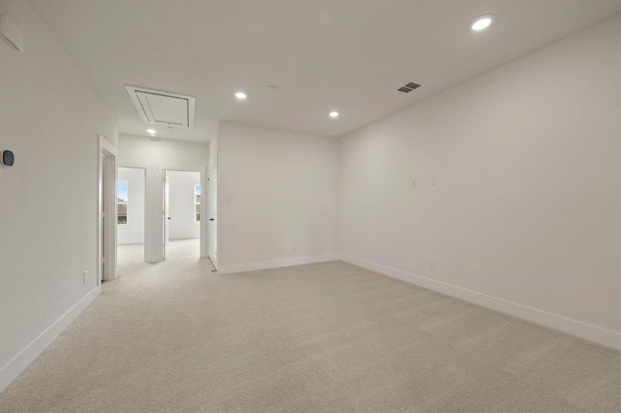 The upstairs game room is a perfect casual family living area.