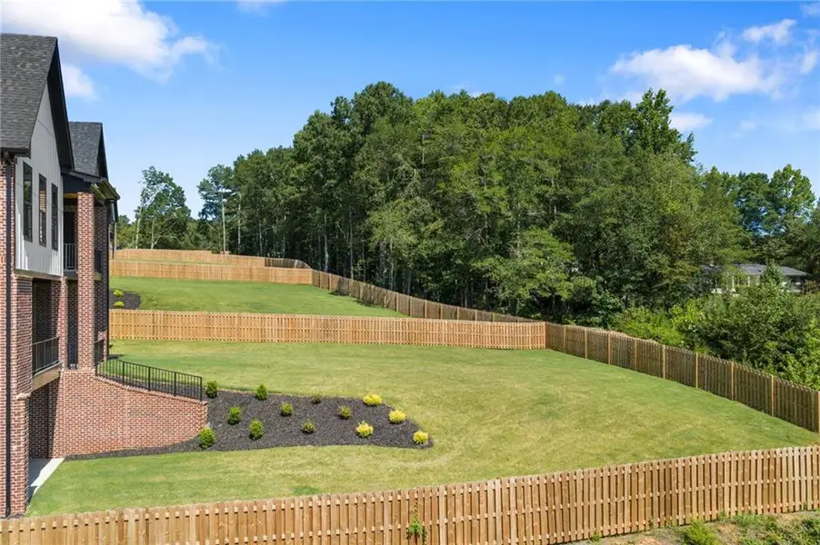 Exterior details and patio area of a home in , Buford (Image 3). Exterior details and patio area of a home in , Buford (Image 3).