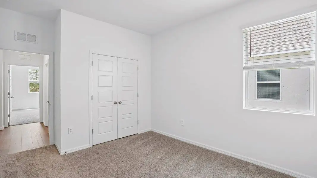 Spacious, unfurnished interior of a new home in Harmony at Lake Eloise, Winter Haven (Image 24).