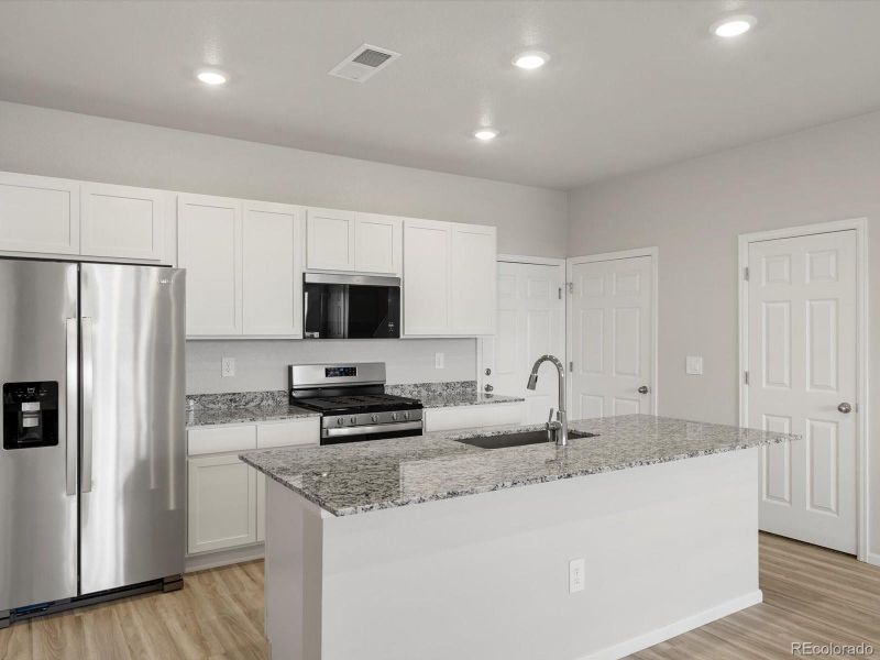 Furnished interior view inside a new home in Horizon Uptown: The Meadow Collection, Aurora (Image 12). Furnished interior view inside a new home in Horizon Uptown: The Meadow Collection, Aurora (Image 12).