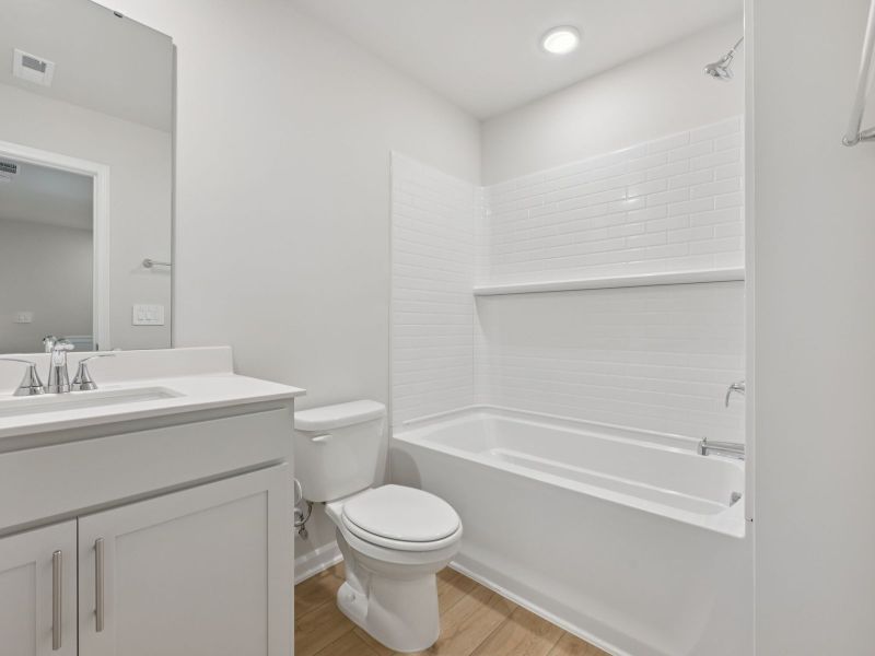 Furnished interior view inside a new home in Oakwood Townes, Mebane (Image 6).