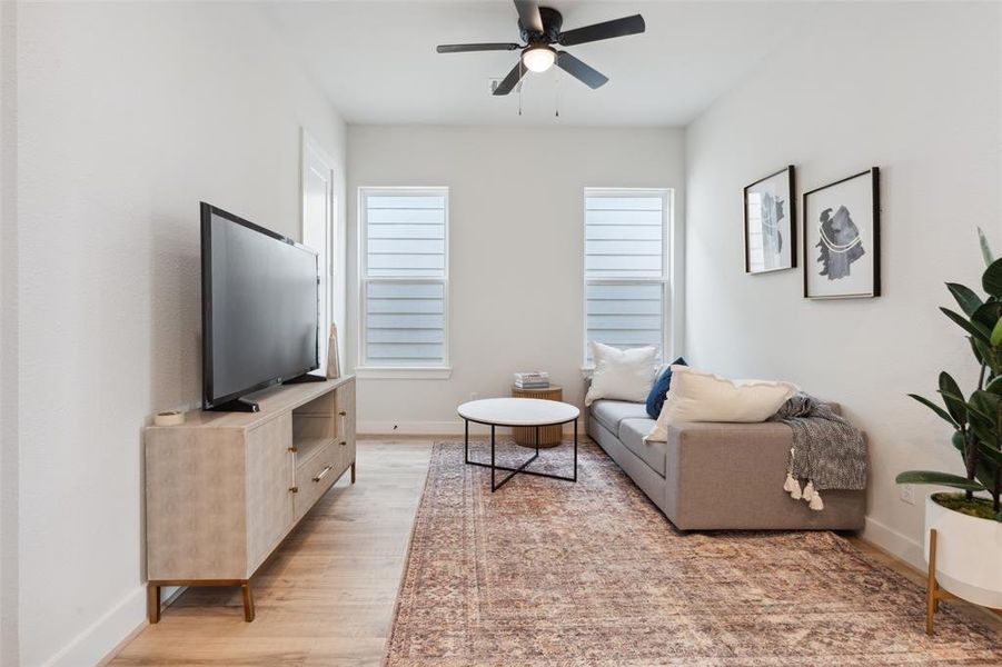 An open space invites light to a secondary living room perfect for relaxation after a long day.