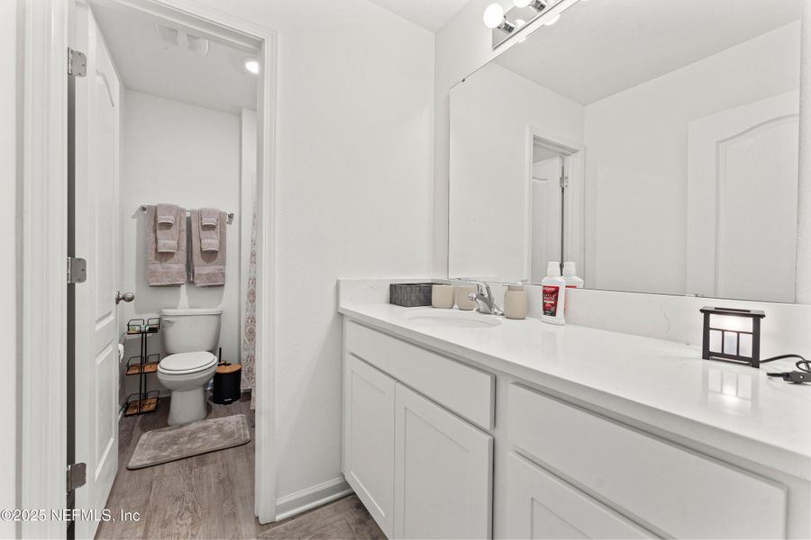 Furnished interior view inside a new home in Cross Creek Express, Green Cove Springs (Image 13).