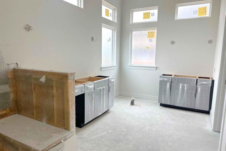 Kitchen featuring concrete floors