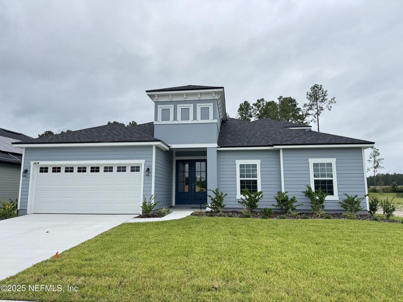 Front exterior of a new home in Hyland Trail, Green Cove Springs, FL, highlighting curb appeal (Image 2).