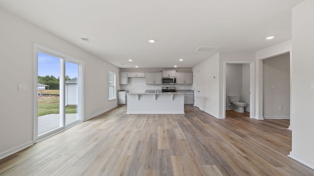 Spacious, unfurnished interior of a new home in Bentley Park, Greenwood (Image 18).