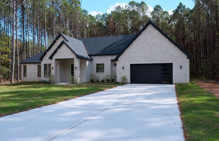 Exterior soffit lighting, upgraded garage door, oversized garage (28x22), oversized driveway. Exterior soffit lighting, upgraded garage door, oversized garage (28x22), oversized driveway.
