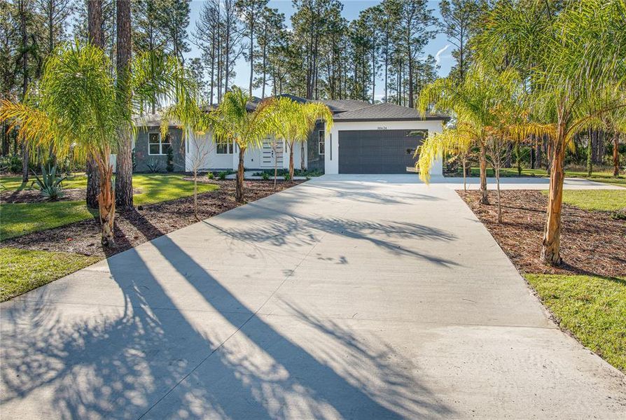 Front exterior of a new home in , Eustis, FL, highlighting curb appeal (Image 23).