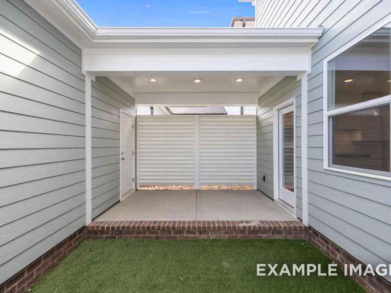 Exterior details and patio area of a home in Forestville Yard, Knightdale (Image 17).