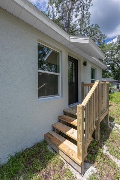 Exterior details and patio area of a home in , Orange City (Image 17).