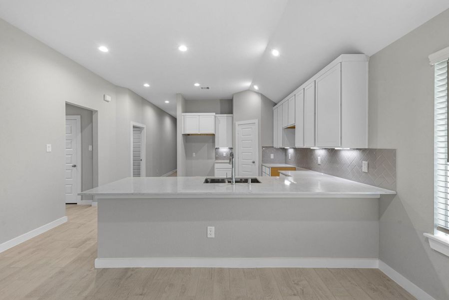 Furnished interior view inside a new home in Barton Creek Ranch, Conroe (Image 5).