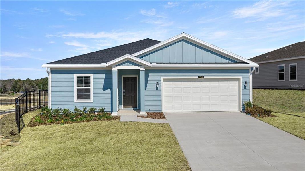 Front exterior of a new home in Trailhead Landing, Alachua, FL, highlighting curb appeal (Image 1). Front exterior of a new home in Trailhead Landing, Alachua, FL, highlighting curb appeal (Image 1).