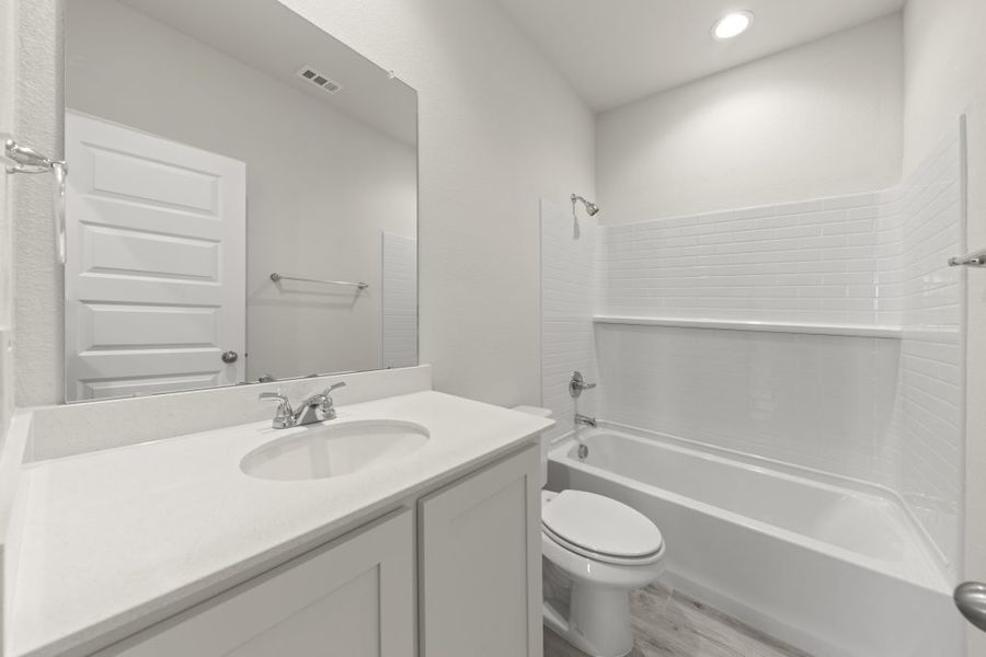 Representative exterior photo of a completed home built from the Cottonwood by Impression Homes in Northspur, Terrell, TX (Image 16).