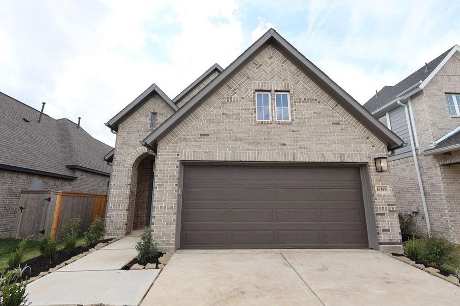 Front exterior of a new home in , Hockley, TX, highlighting curb appeal (Image 1). Front exterior of a new home in , Hockley, TX, highlighting curb appeal (Image 1).