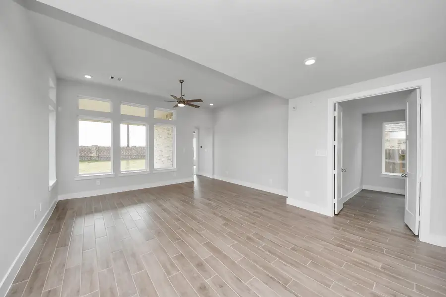 Spacious, unfurnished interior of a new home in Amira: Premier Collection, Tomball (Image 10).