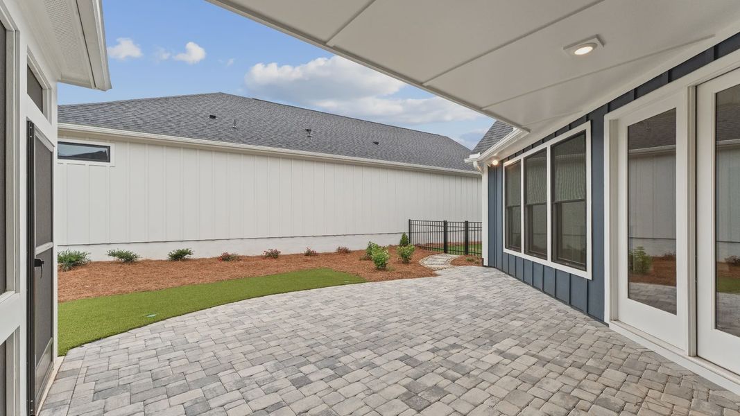 Exterior details and patio area of a home in The Courtyards at Redbud Lane, Canton (Image 28). Exterior details and patio area of a home in The Courtyards at Redbud Lane, Canton (Image 28).