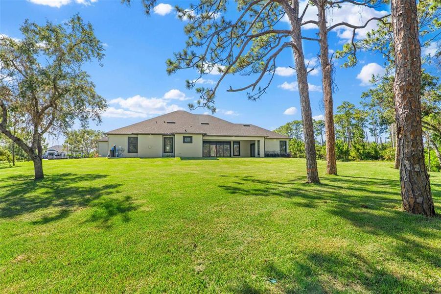 Front exterior of a new home in , Malabar, FL, highlighting curb appeal (Image 2).
