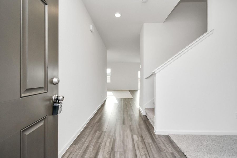 Spacious, unfurnished interior of a new home in Sunterra, Katy (Image 31).