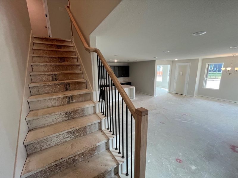 In-progress construction of a new home in The Cottages at Lariat, Liberty Hill, TX (Image 27).